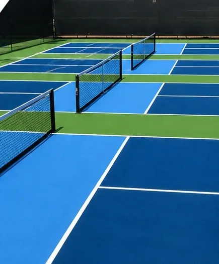 Outdoor pickleball courts with nets
